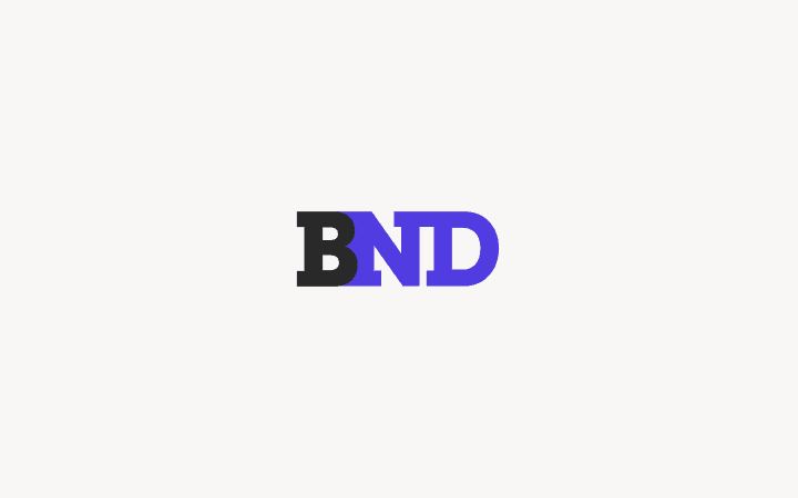 BND logo with black and purple letters on a light pink background.